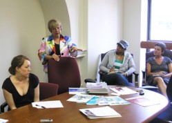 Photo of Boston College students visiting The Immigrant Learning Center, Inc.