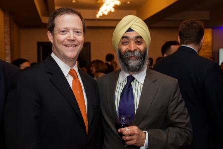 Richard A. Davey, Jr., Secretary and CEO of the Massachusetts Department of Transportation and ILC Trustee, left, poses with ILC Immigrant Entrepreneur award winner Amar Sawhney