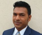 Denzil Rectangular Director of the Public Education Institute Denzil Mohammed