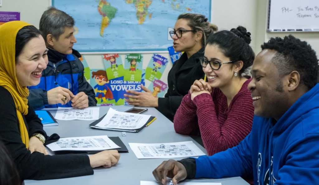 Multicultural students around a table