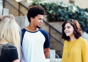 Diverse young people talk