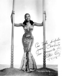 Celia Cruz posing in a gown