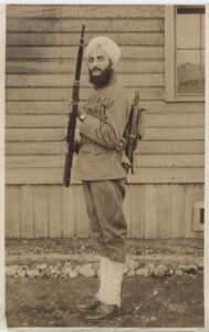 Bhagat Sing Thind wearing a military uniform and turban