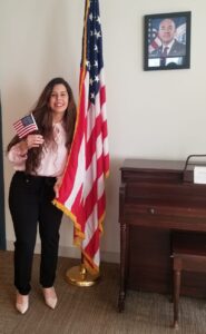 Elisangela with an American flag